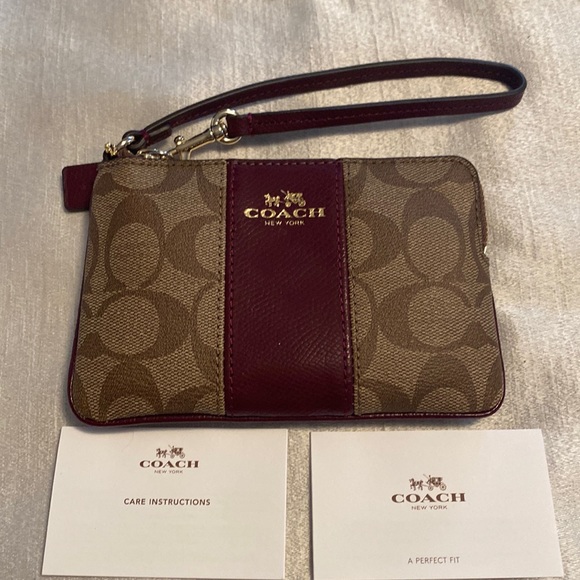 Coach Handbags - COACH CORNER ZIP WRISTLET SIGNATURE CANVAS LEATHER KHAKI SHERRY